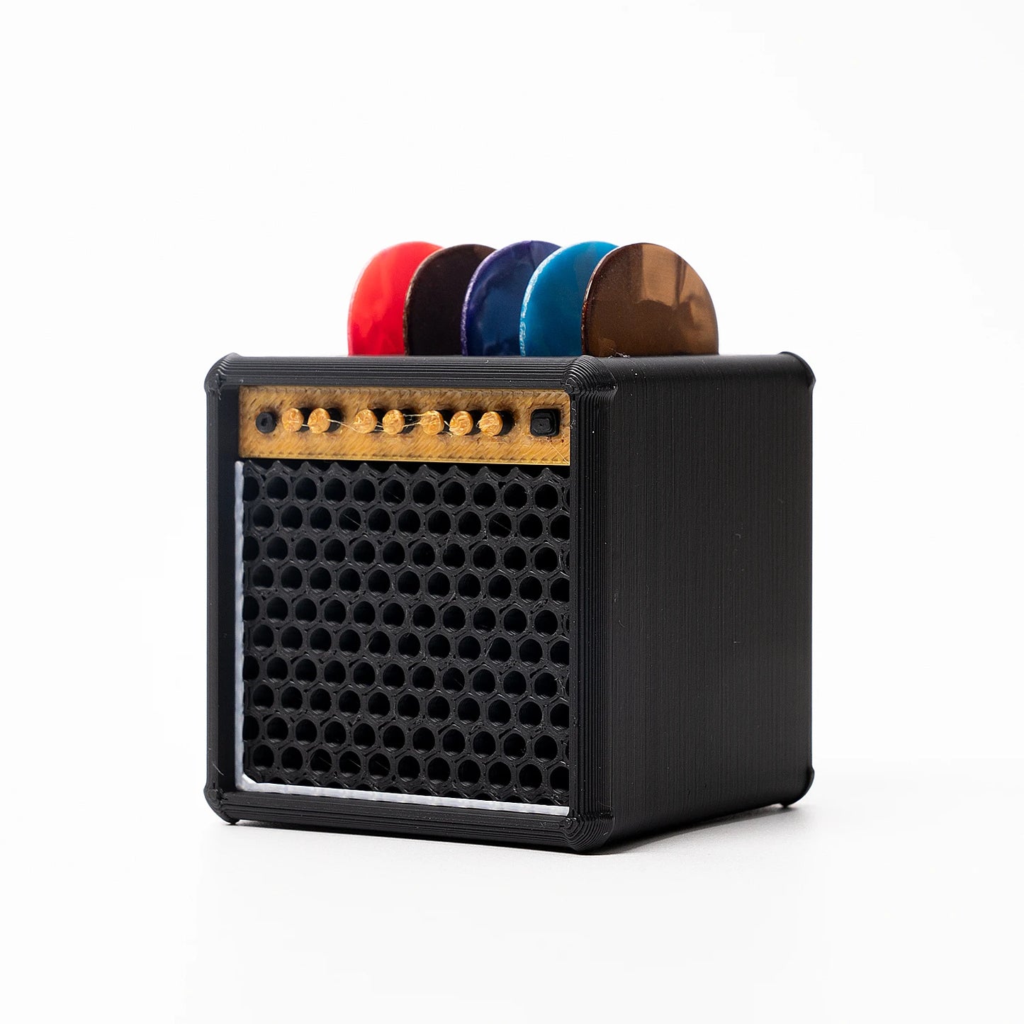 A set of 5 guitar picks + 1 speaker cabinet-shaped storage box, with an adorable design specifically for guitar picks.