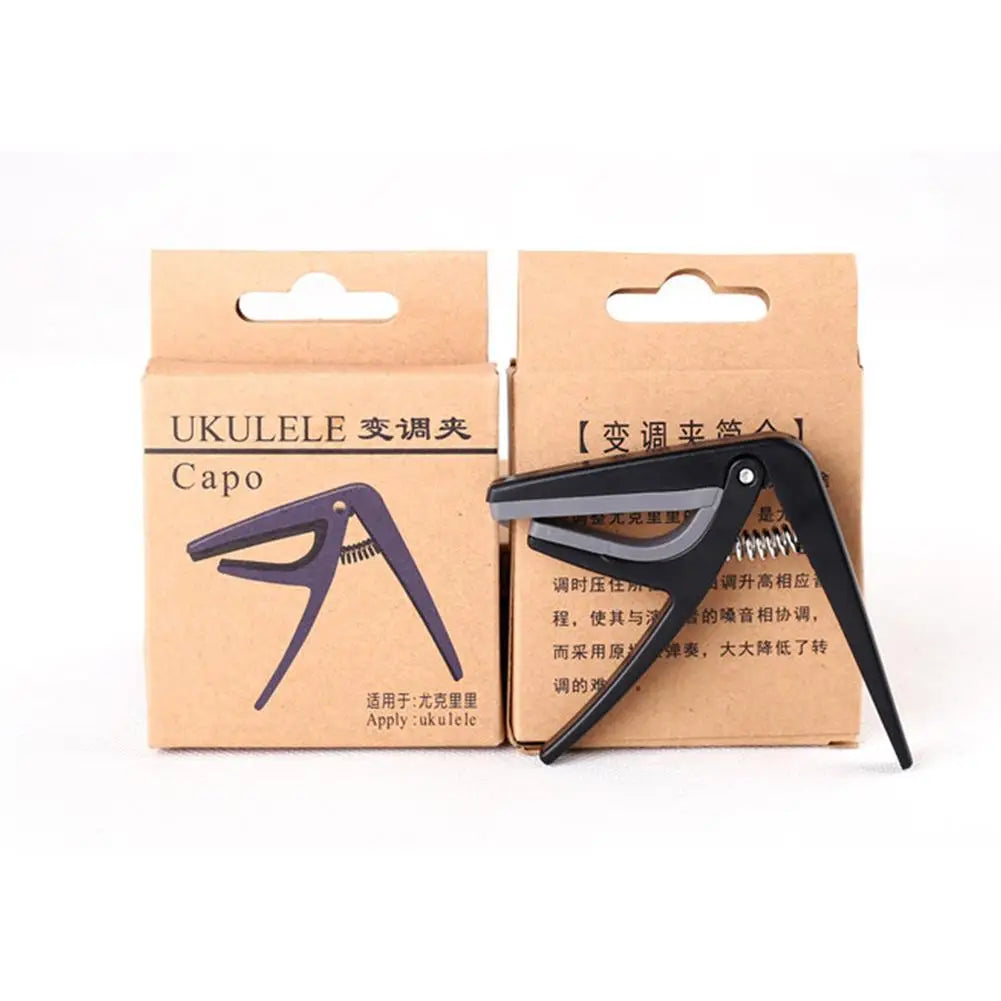 Professional Ukulele Capo Single-handed Quick Change Ukelele Capo 4 Strings Hawaii Guitar Capos Guitar Parts & Accessories