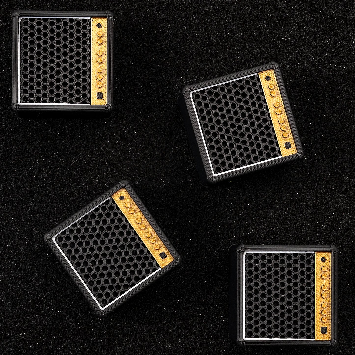 A set of 5 guitar picks + 1 speaker cabinet-shaped storage box, with an adorable design specifically for guitar picks.